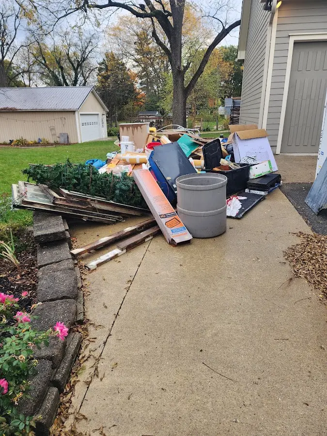 Dumpster being loaded with debris for 30 Yard Dumpster Rental in Washingtonville